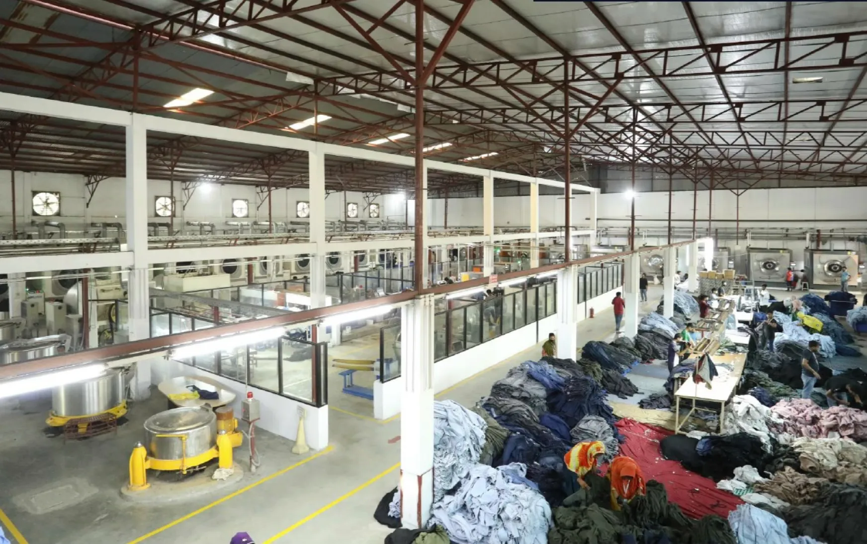 Washed garments hung to dry before finishing